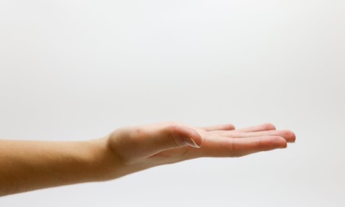 Hand reaching out for a raise