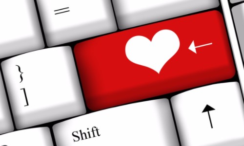 Keyboard with red heart on the Enter Key